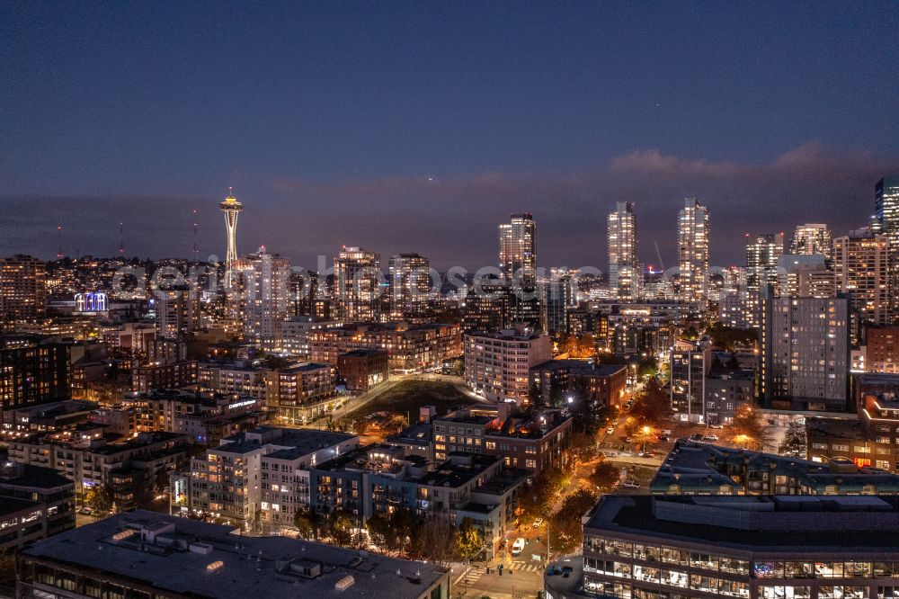 Seattle at night from the bird perspective: Night lighting city center with the skyline in the downtown area in Seattle in Washington, United States of America
