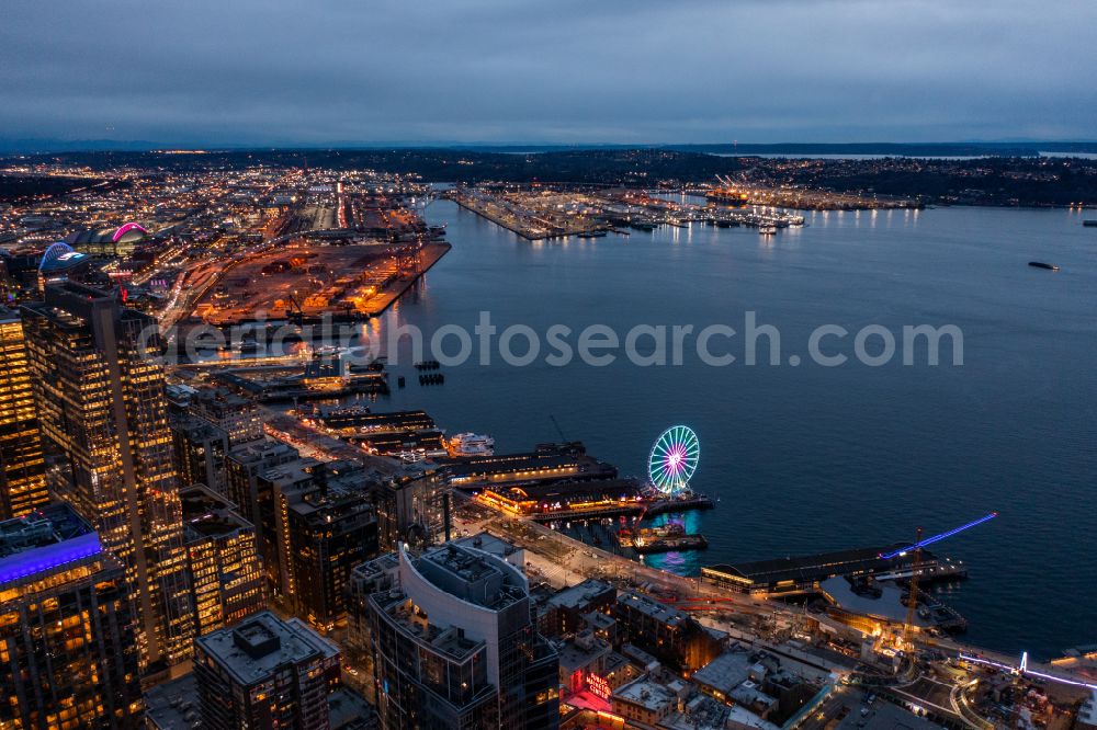 Aerial photograph at night Seattle - Night lighting city center with the skyline in the downtown area in Seattle in Washington, United States of America