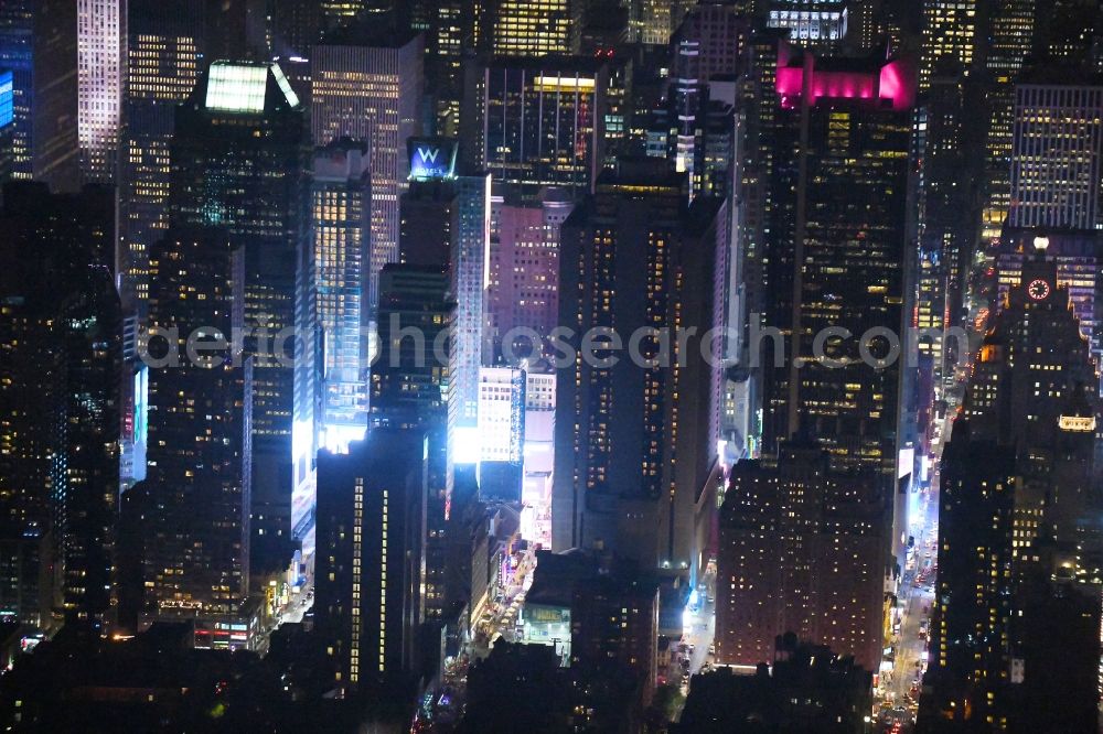 New York at night from the bird perspective: Night lighting City center with the skyline between Times Squar - Broadway in the downtown area in the district Manhattan in New York in United States of America
