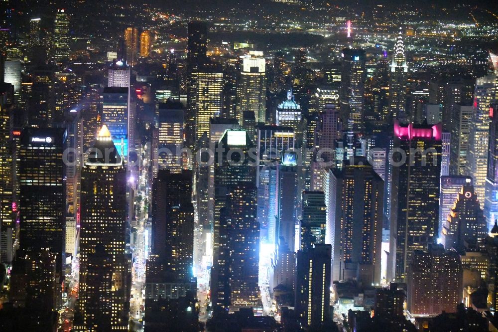 New York at night from above - Night lighting City center with the skyline between Times Squar - Broadway in the downtown area in the district Manhattan in New York in United States of America