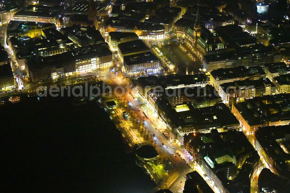 Hamburg at night from above - Night lighting street guide of famous promenade and shopping street Jungfernstieg on Ufer of Binnenalster in the district Neustadt in Hamburg, Germany