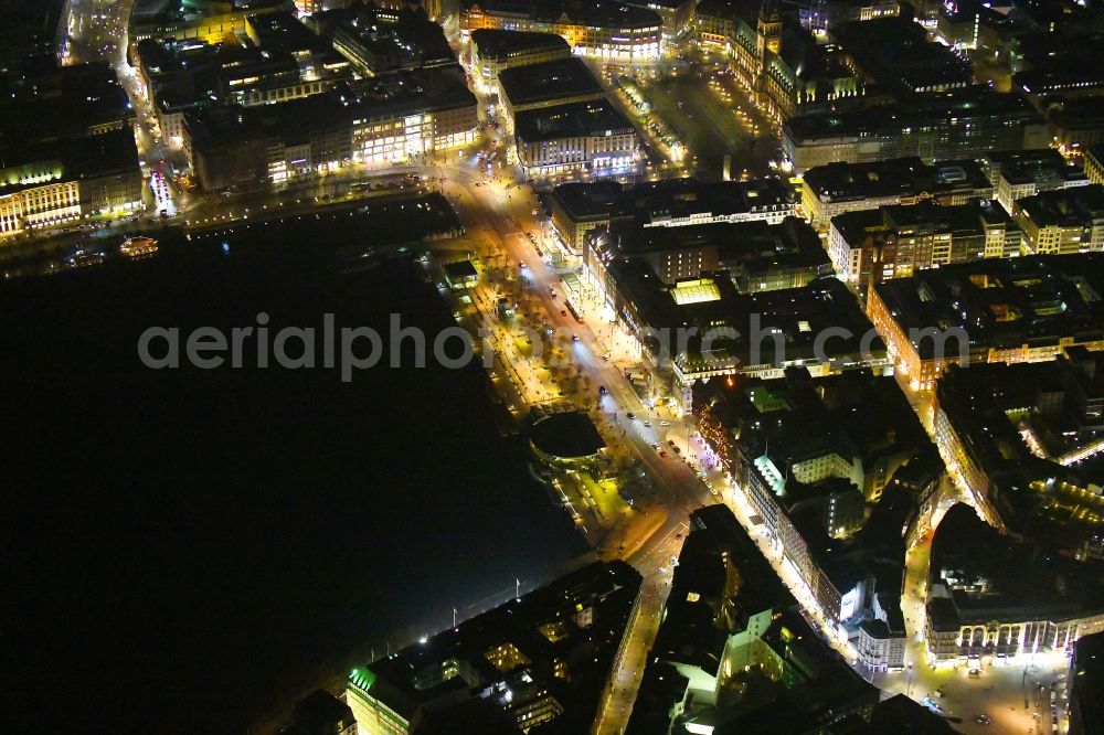Hamburg at night from the bird perspective: Night lighting street guide of famous promenade and shopping street Jungfernstieg on Ufer of Binnenalster in the district Neustadt in Hamburg, Germany