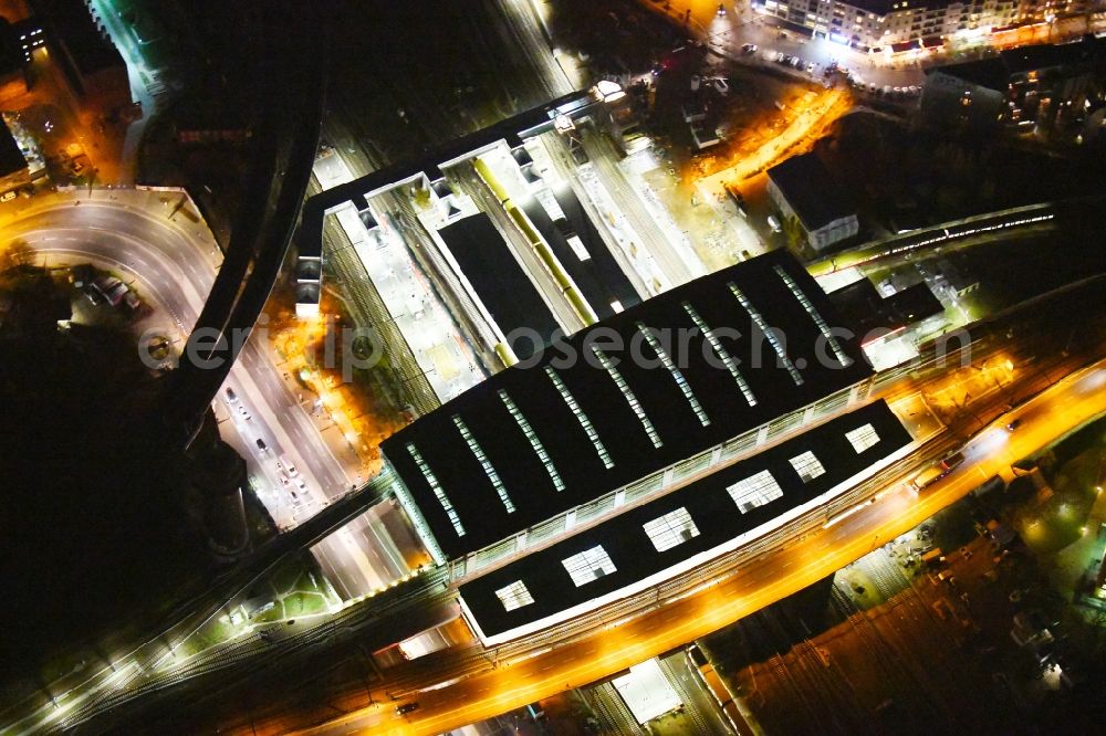 Aerial image at night Berlin - Night lighting Route expansion station - Warschauer road to east cross rail station Ostkreuz Friedrichshain district of Berlin