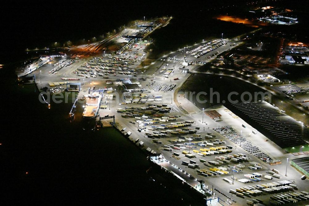 Travemünde at night from above - Night lighting building complex and distribution center on the site of Terminal Skandinavienkai in the district Ivendorf in Travemuende in the state Schleswig-Holstein, Germany