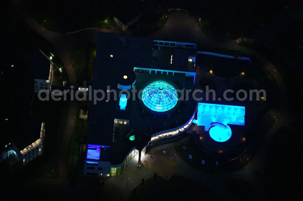 Bad Rothenfelde at night from above - Night lighting Spa and swimming pools at the swimming pool of the leisure facility carpesol Bad Rothenfelde Sole SPA in Bad Rothenfelde in the state Lower Saxony, Germany