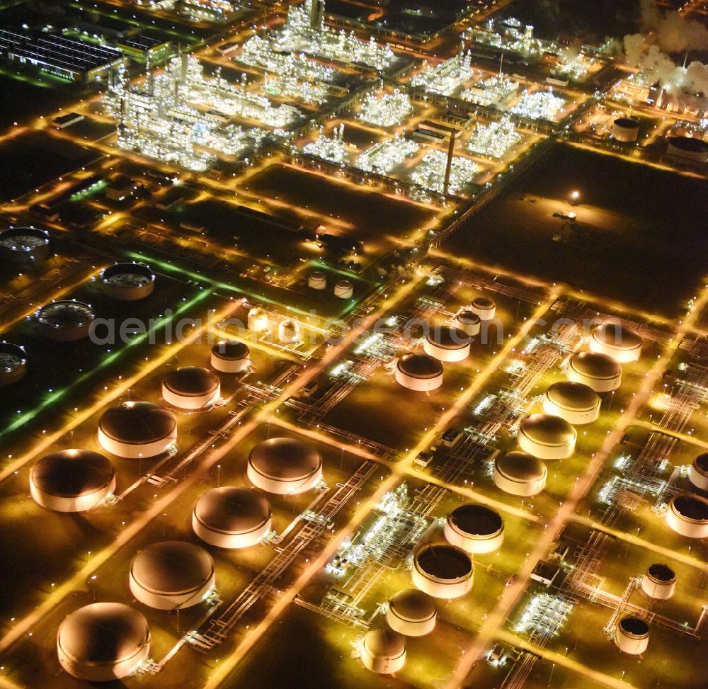 Leuna at night from above - Night lighting tOTAL refinery in central Germany in Leuna in the federal state of Saxony-Anhalt. The TOTAL refinery chemical site Leuna is one of the most modern refineries in Europe
