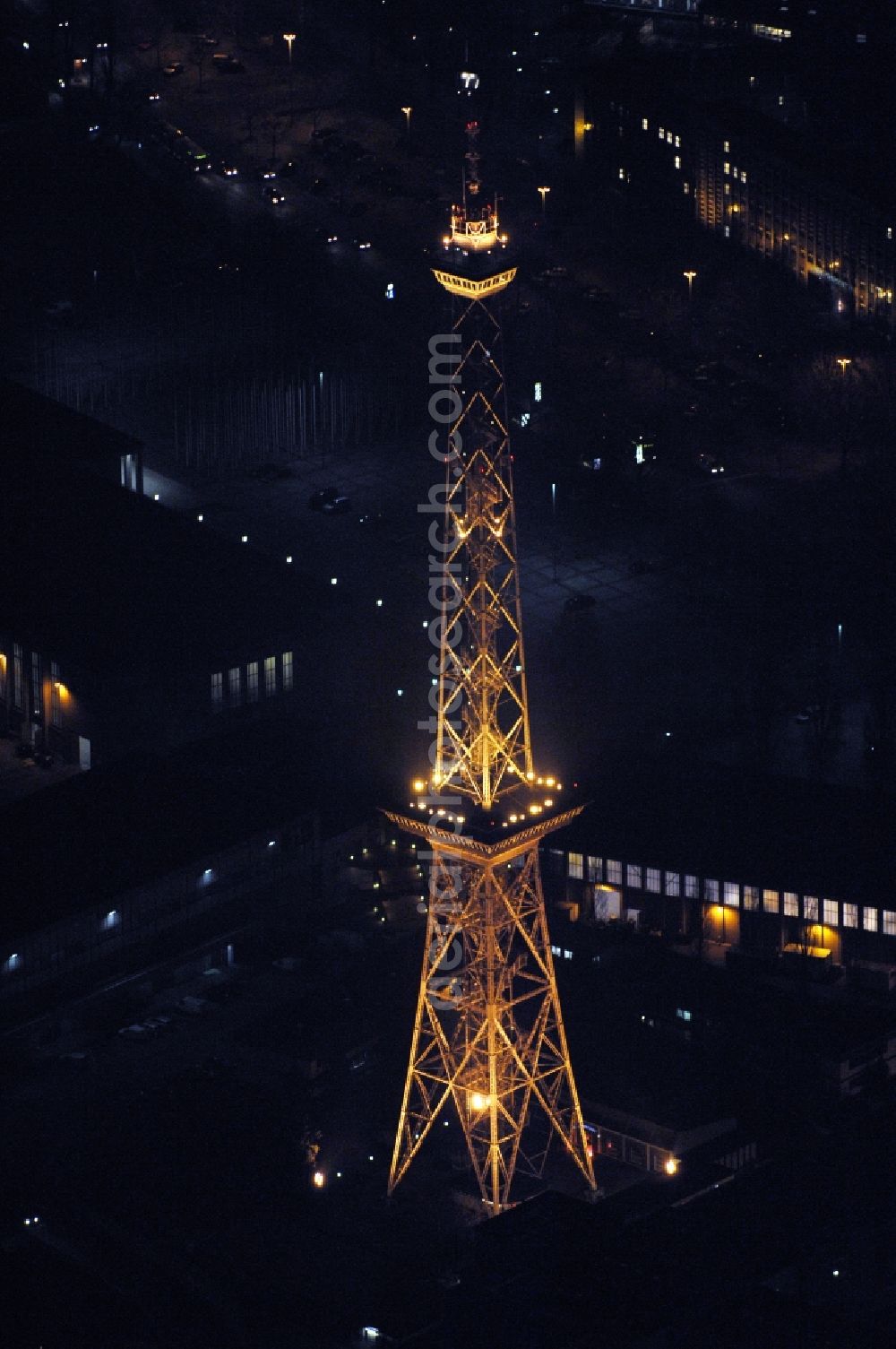 Aerial photograph at night Berlin - Night lighting Tourist attraction and sightseeing Funkturm on Messegelaende in the district Charlottenburg in Berlin, Germany