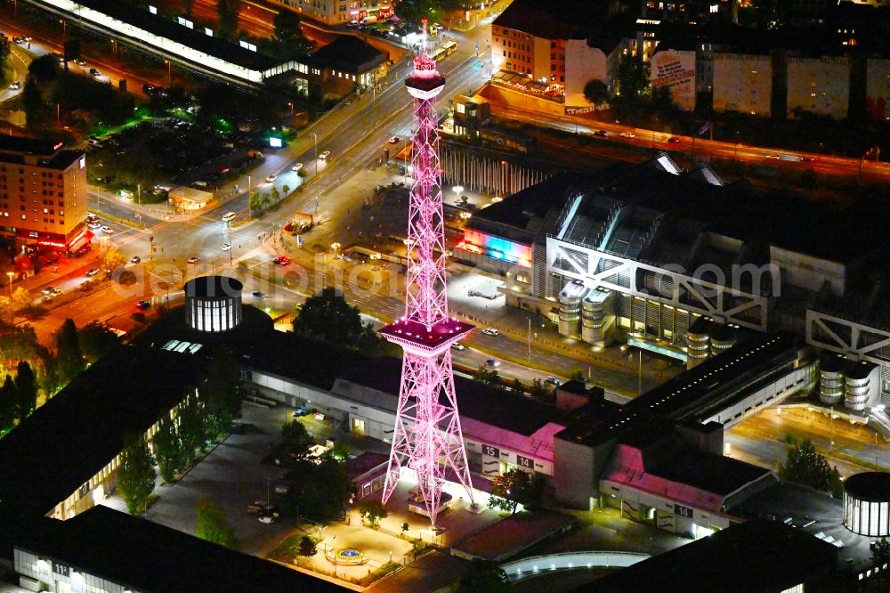 Aerial photograph at night Berlin - Night blue lighting Tourist attraction and sightseeing Funkturm on Messegelaende in the district Charlottenburg in Berlin, Germany