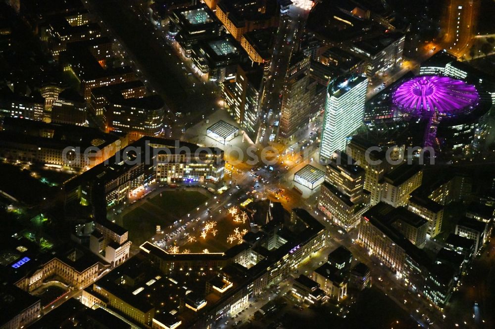 Berlin at night from above - Night lighting Tourist attraction and sightseeing Potsdamer and Leipziger Platz in the district Mitte in Berlin, Germany