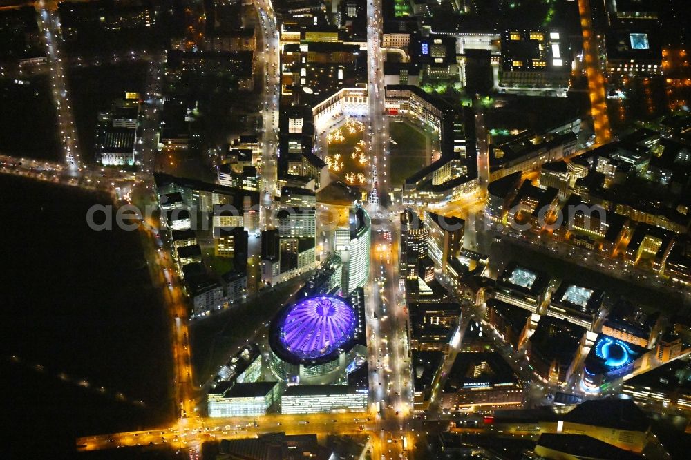 Berlin at night from the bird perspective: Night lighting Tourist attraction and sightseeing Potsdamer and Leipziger Platz in the district Mitte in Berlin, Germany