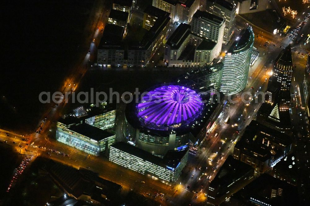 Aerial image at night Berlin - Night lighting Tourist attraction and sightseeing Potsdamer and Leipziger Platz in the district Mitte in Berlin, Germany