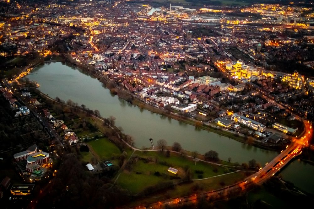 Münster at night from above - Night lighting riparian areas on the lake area of of Aasee in Muenster in the state North Rhine-Westphalia, Germany