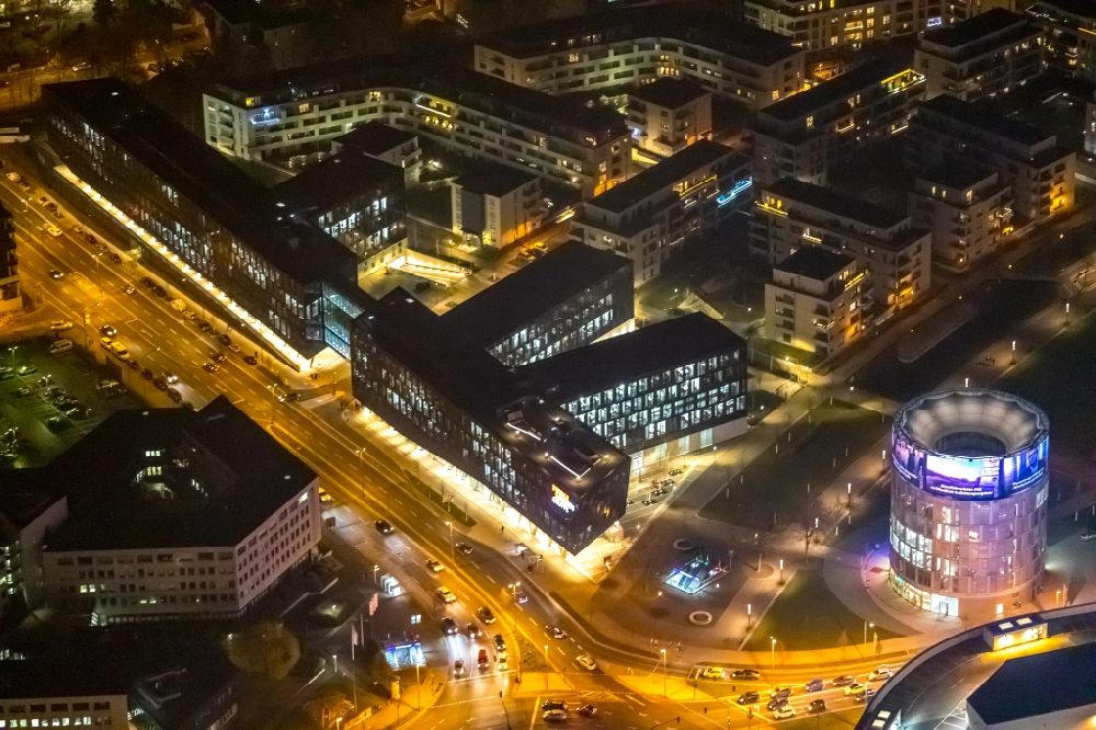 Essen at night from the bird perspective: Night lighting administration building of the company of Funke Mediengruppe on Berliner Platz in Essen in the state North Rhine-Westphalia, Germany