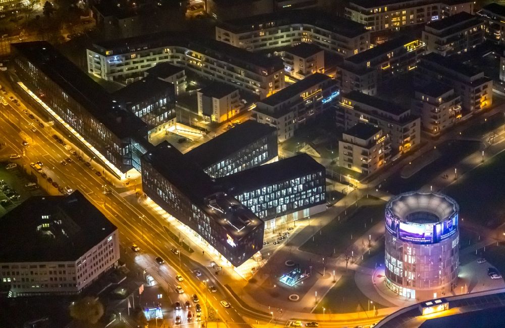 Aerial image at night Essen - Night lighting administration building of the company of Funke Mediengruppe on Berliner Platz in Essen in the state North Rhine-Westphalia, Germany