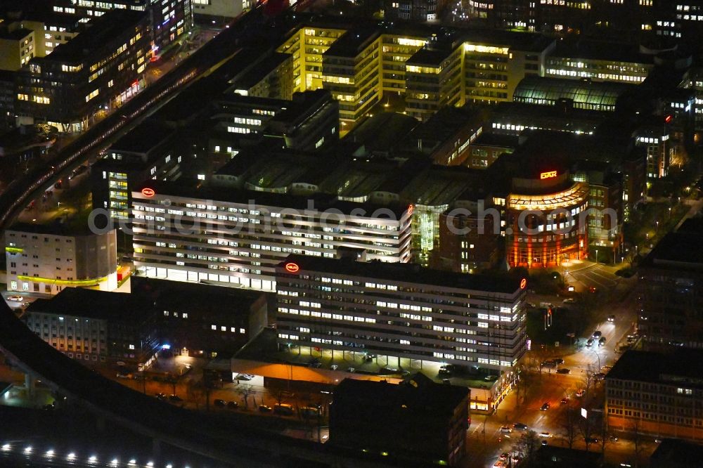 Aerial photograph at night Hamburg - Night lighting administration building of the company of HELM AG on Nordkanalstrasse in the district Hammerbrook in Hamburg, Germany