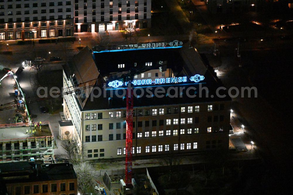 Aerial image at night München - Night lighting administration building of the company of Knorr-Bremse AG on street Moosacher Strasse in the district Milbertshofen in Munich in the state Bavaria, Germany