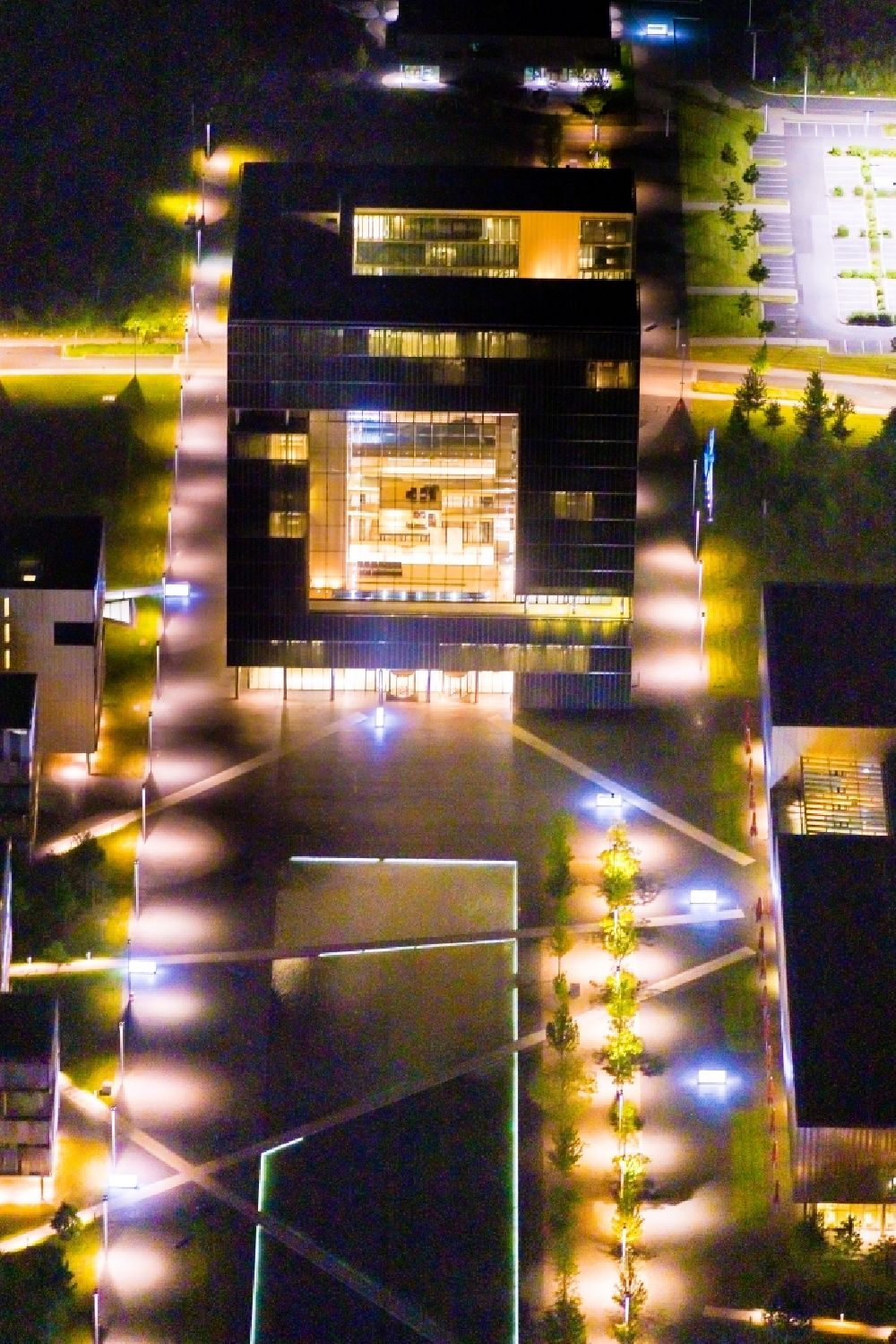 Essen at night from above - Night lighting administration building of the company of Thyssenkrupp AG Building ensemble Krupp - Guertel in Krupp Park on Altendorfer Strasse at the corner of Berthold-Beitz-Boulevard in the district Westviertel in Essen at Ruhrgebiet in the state North Rhine-Westphalia, Germany