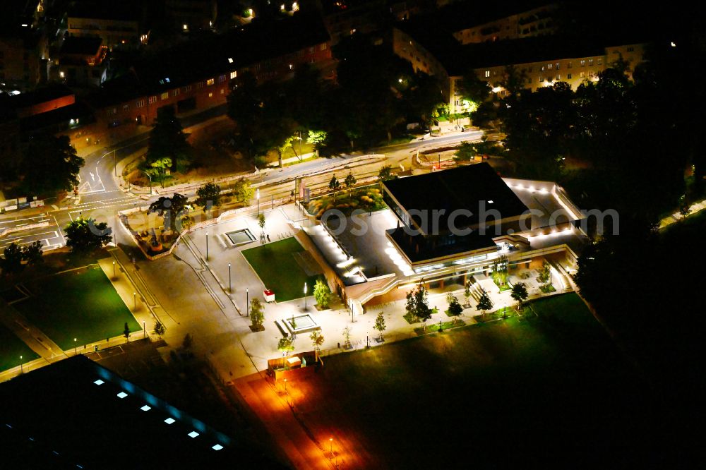 Potsdam at night from the bird perspective: Night lighting building of the indoor arena DAS MINSK Kunsthaus on street Max-Planck-Strasse in Potsdam in the state Brandenburg, Germany