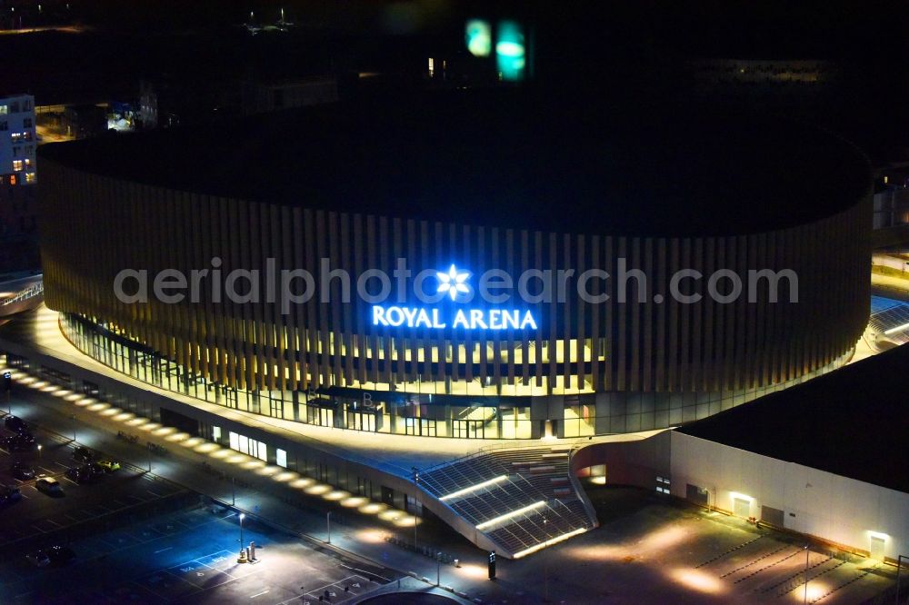 Aerial image at night Kopenhagen - Night lighting Building of the indoor arena Royal Arena on Hannemanns Alle in Copenhagen in Region Hovedstaden, Denmark