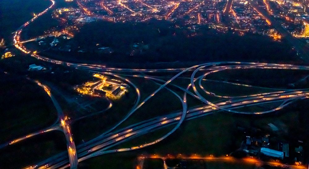 Aerial image at night Duisburg - Night lighting Traffic flow at the intersection- motorway A 40 to the A3 in Duisburg in the state North Rhine-Westphalia, Germany