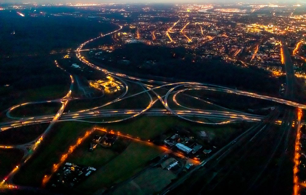 Duisburg at night from above - Night lighting Traffic flow at the intersection- motorway A 40 to the A3 in Duisburg in the state North Rhine-Westphalia, Germany