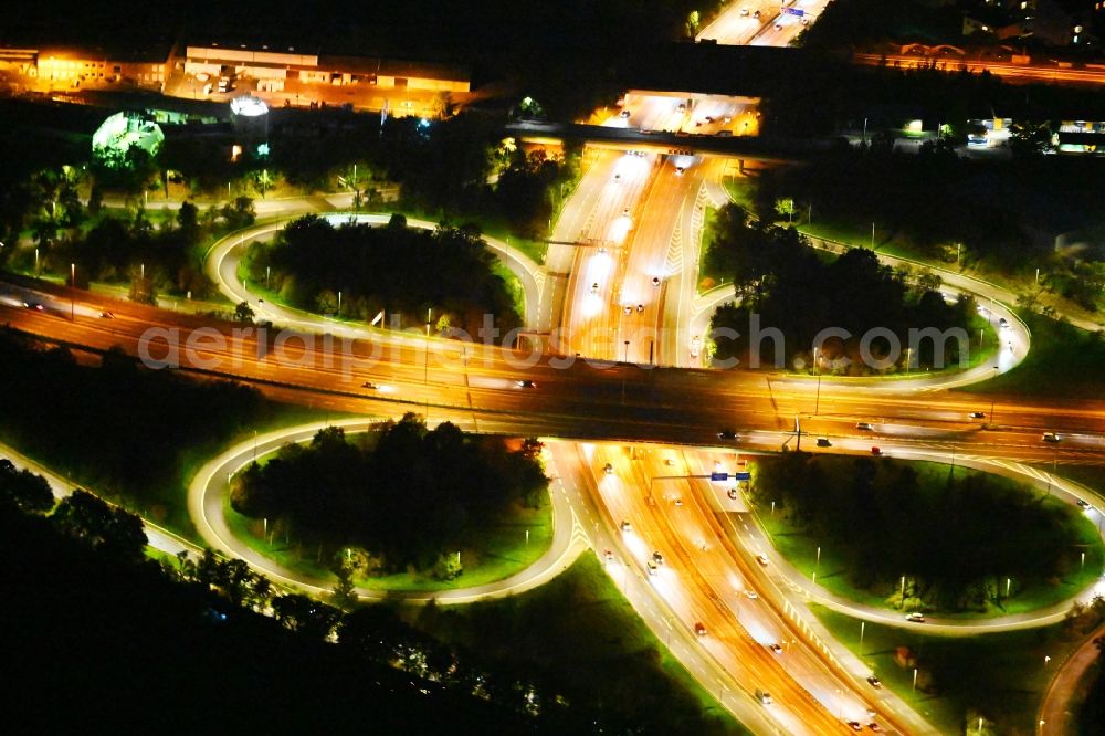 Berlin at night from above - Night lighting traffic flow at the intersection- motorway A 100 to the A103 in the district Tempelhof-Schoeneberg in Berlin, Germany