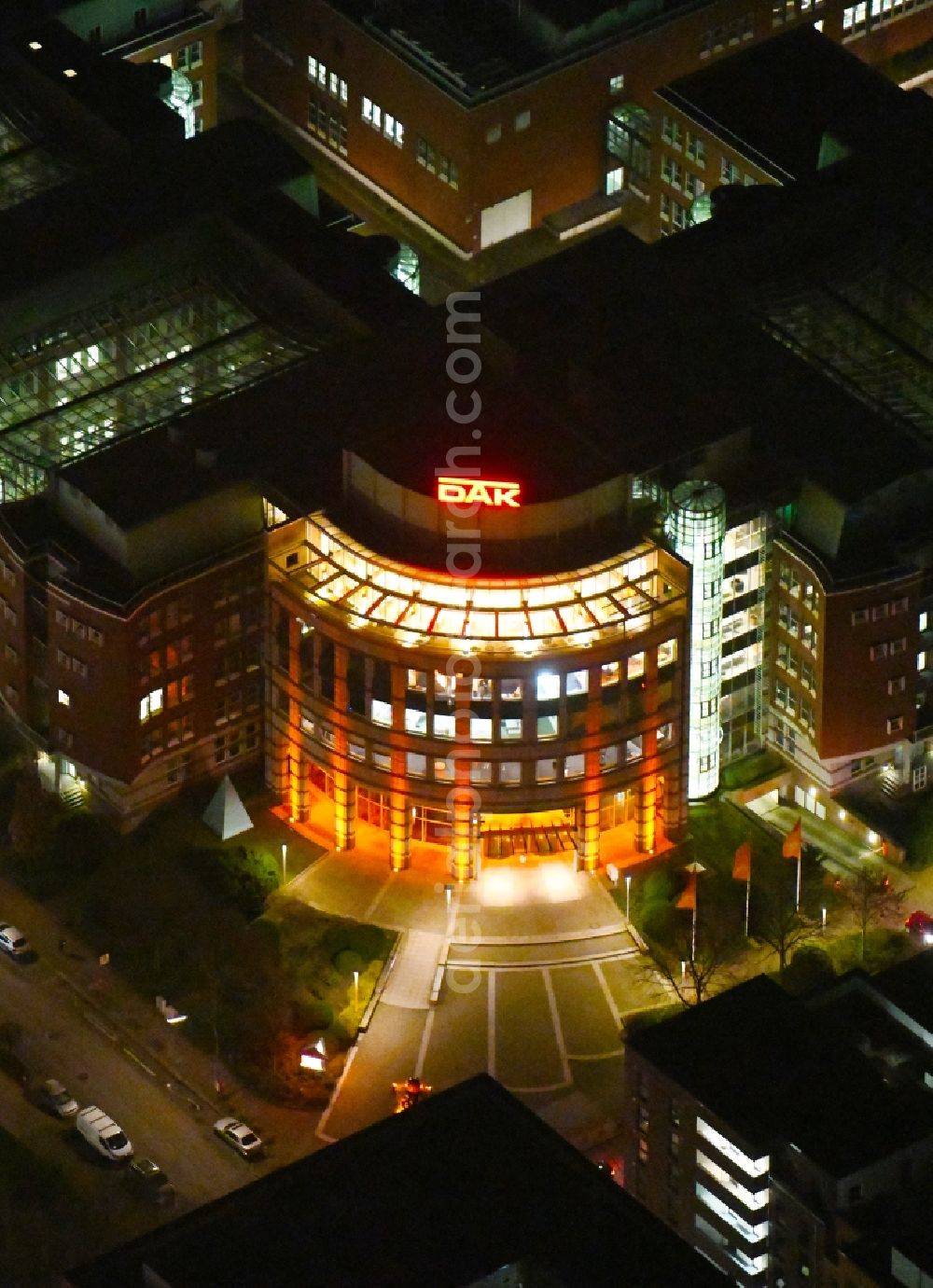 Hamburg at night from above - Night lighting office and administration buildings of the insurance company DAK-Gesundheit on Nagelsweg corner Albertstrasse in the district Hammerbrook in Hamburg, Germany