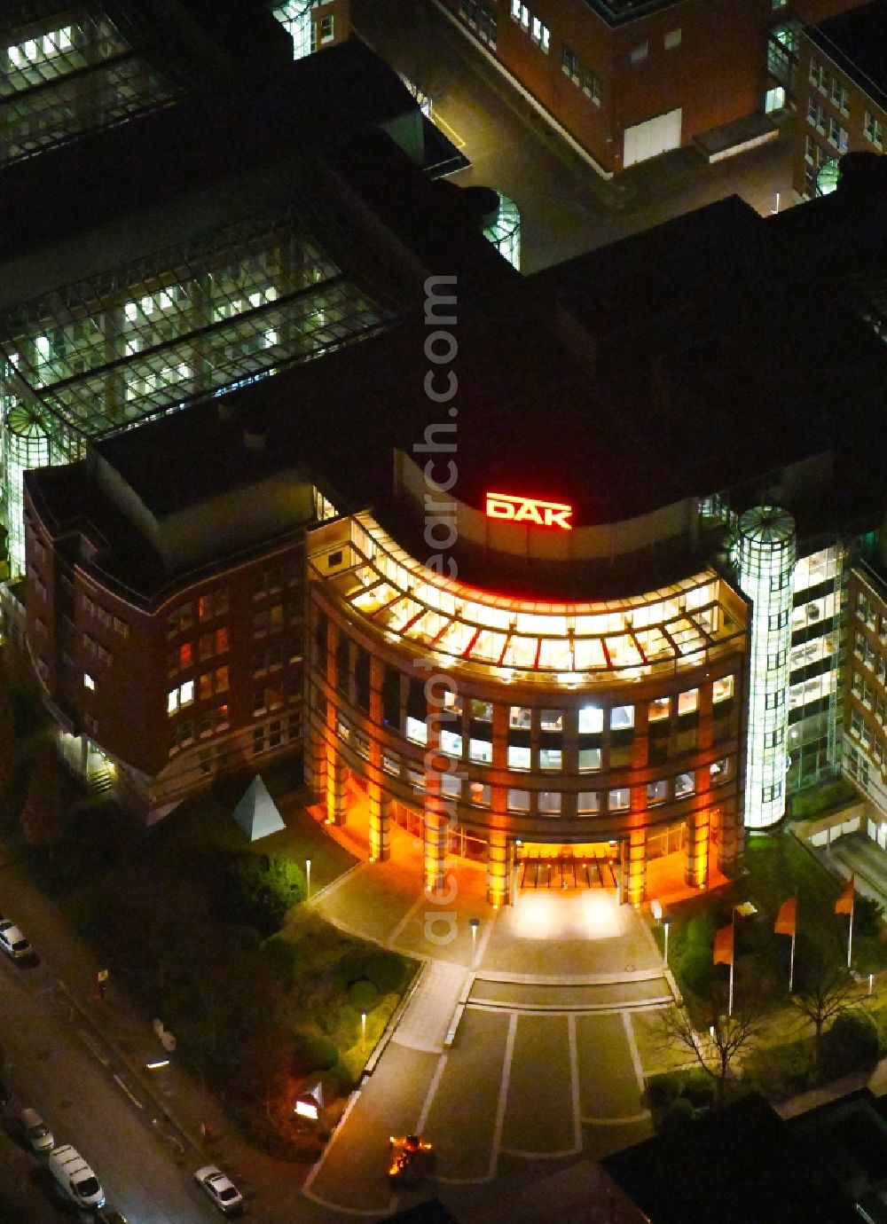 Aerial photograph at night Hamburg - Night lighting office and administration buildings of the insurance company DAK-Gesundheit on Nagelsweg corner Albertstrasse in the district Hammerbrook in Hamburg, Germany