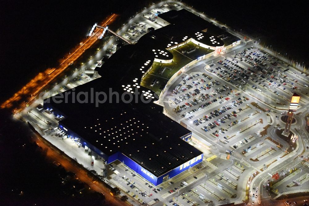 Lübeck at night from above - Night view building the shopping mall LUV SHOPPING at IKEA furnishing house in Daenischburg, Luebeck in Schleswig-Holstein