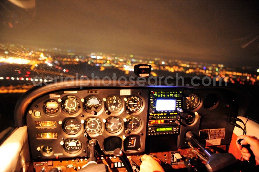 Aerial image at night Schönefeld - Night aerial view of the landing in the cockpit of a Cessna 172 at the airport BER / BBI AIRPORT BERLIN BRANDENBURG Willi Brandt in Schönefeld in Brandenburg