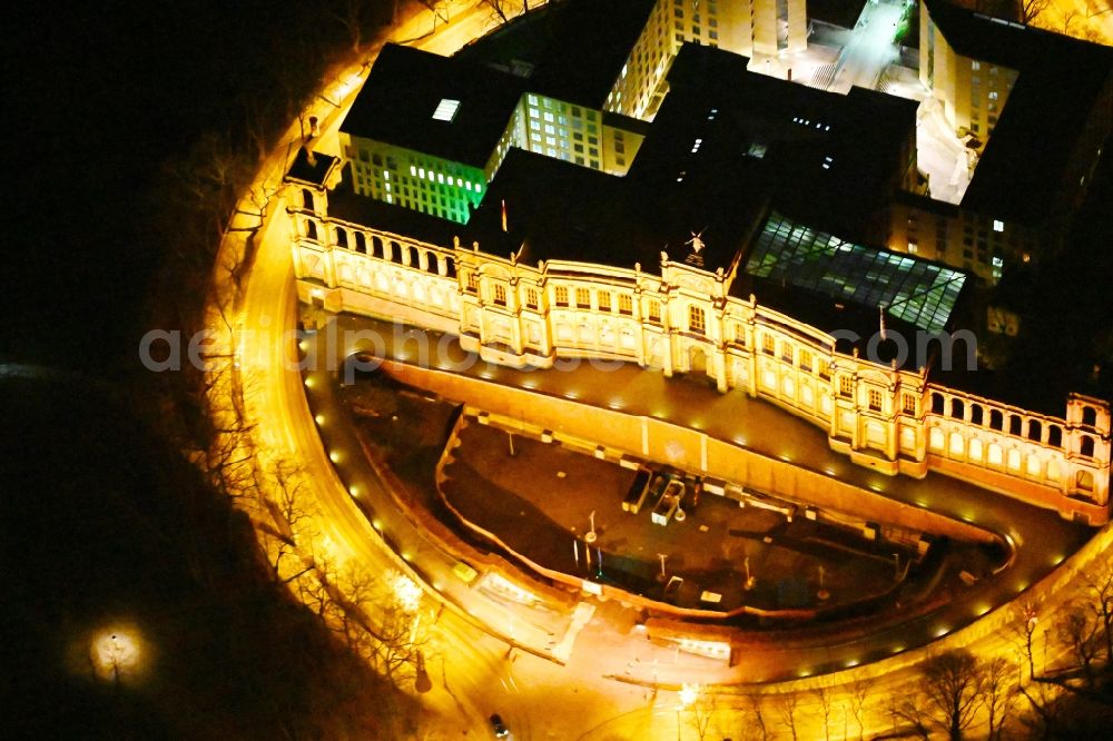 Aerial image at night München - Night view of palatial building Maximilianeum in the Haidhausen part of Munich in the state of Bavaria. The historic building is located on the Maximilian Bridge and includes the foundation Maximilianeum and has been seat of the Bavarian parliament