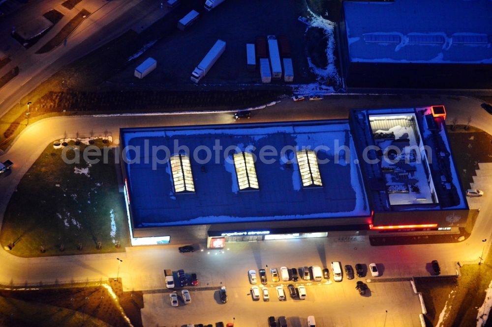 Aerial photograph at night Bergkirchen - Night aerial of the new building of the clothing store Engelbert Strauss in Bergkirchen in Bavaria