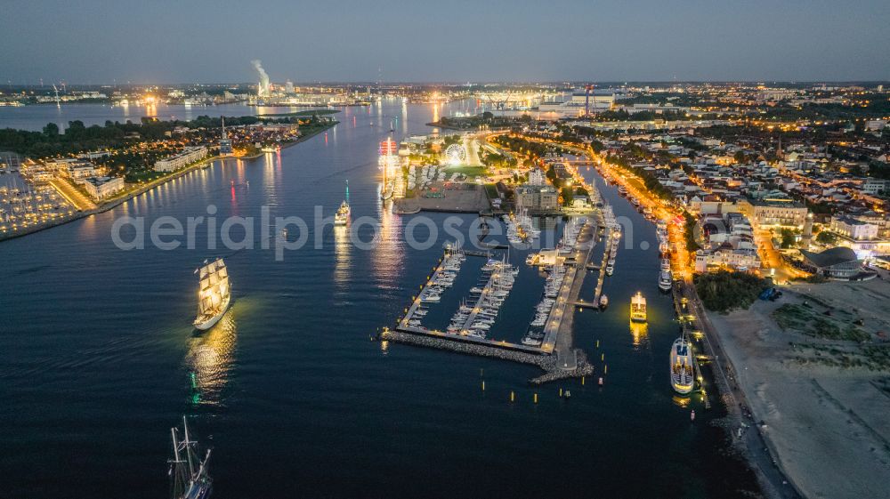 Rostock at night from above - Night lighting water surface at the seaside mole of in the district Warnemuende in Rostock in the state Mecklenburg - Western Pomerania, Germany