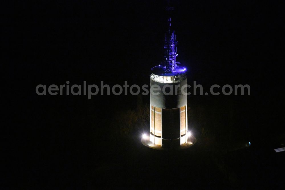Aerial photograph at night Pforzheim - Night lighting radio tower and transmitter on the crest of the mountain range on Wartbergallee in Pforzheim in the state Baden-Wurttemberg, Germany