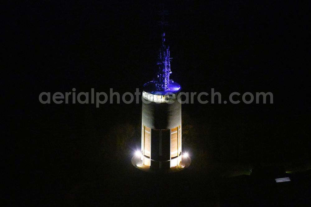 Pforzheim at night from the bird perspective: Night lighting radio tower and transmitter on the crest of the mountain range on Wartbergallee in Pforzheim in the state Baden-Wurttemberg, Germany