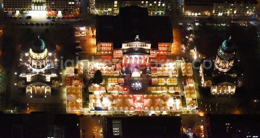 Berlin at night from above - Night view christmas market on place area Gendarmenmarkt with the building ensemble German and French Cathedral, Schauspielhaus in Berlin Mitte
