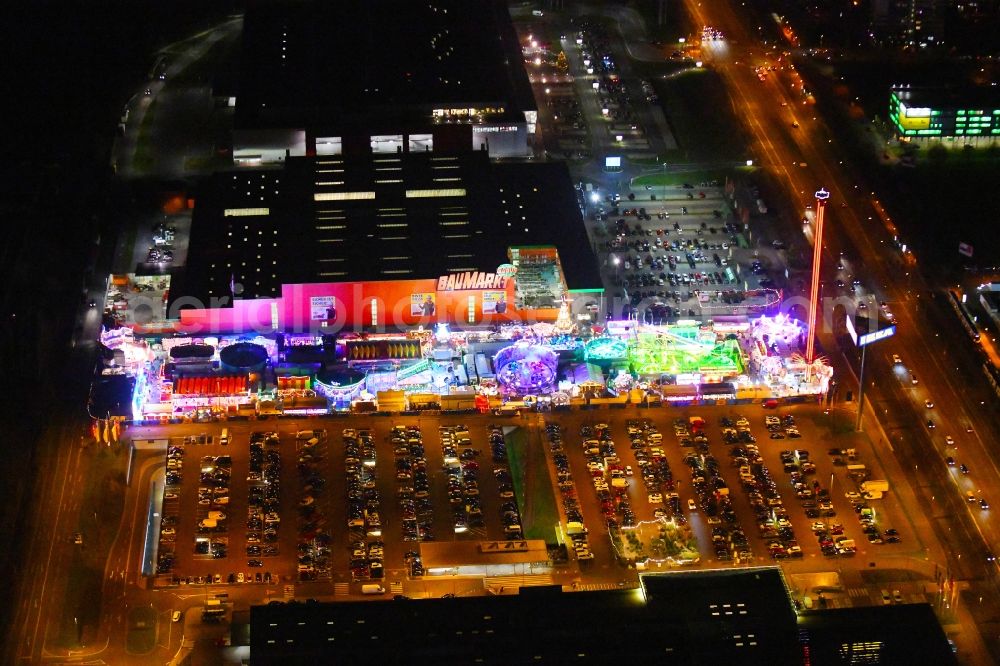 Aerial photograph at night Berlin - Night lighting christmas - event site on Landsberger Allee in the district Lichtenberg in Berlin, Germany