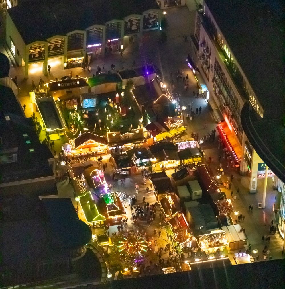 Dortmund at night from above - Night lighting christmassy market event grounds and sale huts and booths on Hansaplatz in Dortmund in the state North Rhine-Westphalia, Germany