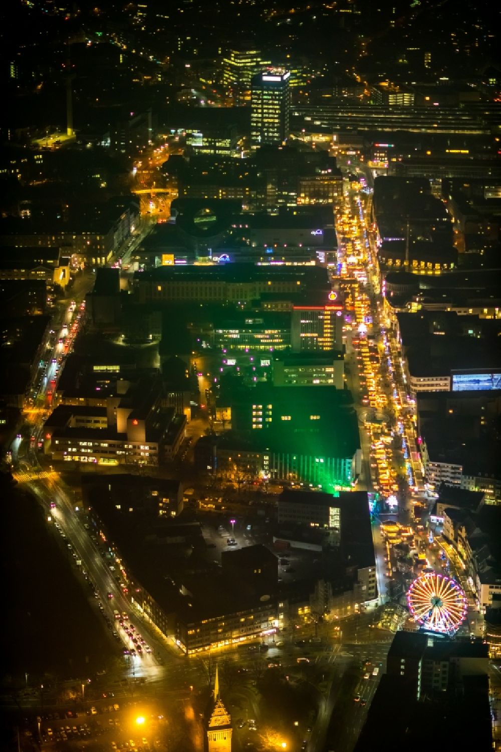Aerial image at night Duisburg - Night lighting christmassy market event grounds and sale huts and booths auf der Koenigsstrasse in Duisburg in the state North Rhine-Westphalia. In the picture as well the shopping centre Duisburg