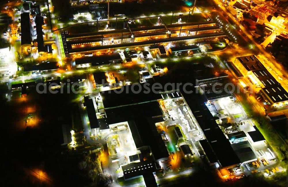 Aerial image at night Hamburg - Night lighting building and production halls on the premises on Aluminiumstrasse in the district Altenwerder in Hamburg, Germany