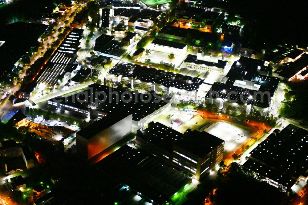 Berlin at night from above - Night lighting factory area of a??a??the Bayerische Motoren Werke / BMW AG motorcycle plant at the Juliusturm in the district of Spandau in Berlin, Germany