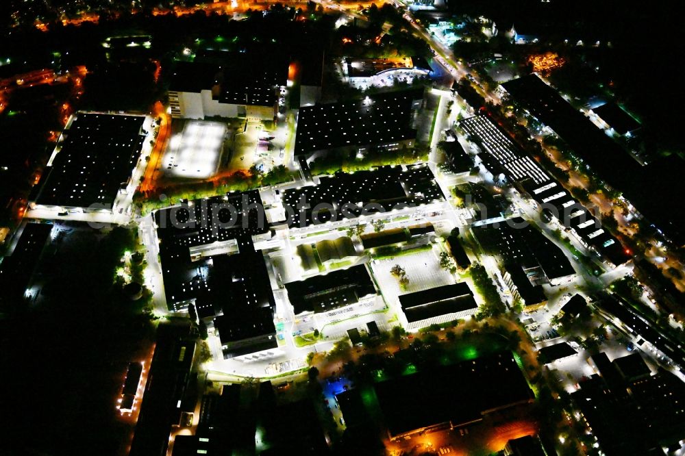 Aerial image at night Berlin - Night lighting factory area of a??a??the Bayerische Motoren Werke / BMW AG motorcycle plant at the Juliusturm in the district of Spandau in Berlin, Germany