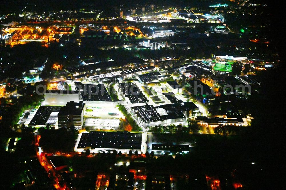 Aerial photograph at night Berlin - Night lighting factory area of the Bayerische Motoren Werke / BMW AG motorcycle plant at the Juliusturm in the district of Spandau in Berlin, Germany