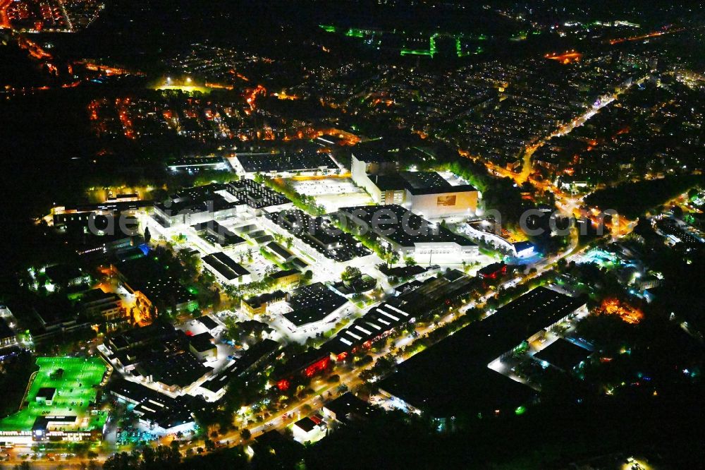 Berlin at night from above - Night lighting factory area of the Bayerische Motoren Werke / BMW AG motorcycle plant at the Juliusturm in the district of Spandau in Berlin, Germany