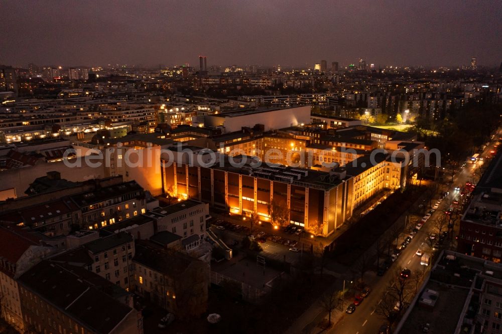 Berlin at night from the bird perspective: Night lighting building and production halls on the premises of der Bundesdruckerei in the district Kreuzberg in Berlin