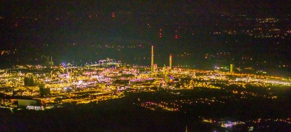 Aerial image at night Marl - Night lighting building and production halls on the premises of the chemical manufacturers Chemiepark Marl on Paul-Baumann Strasse in Marl in the state North Rhine-Westphalia, Germany