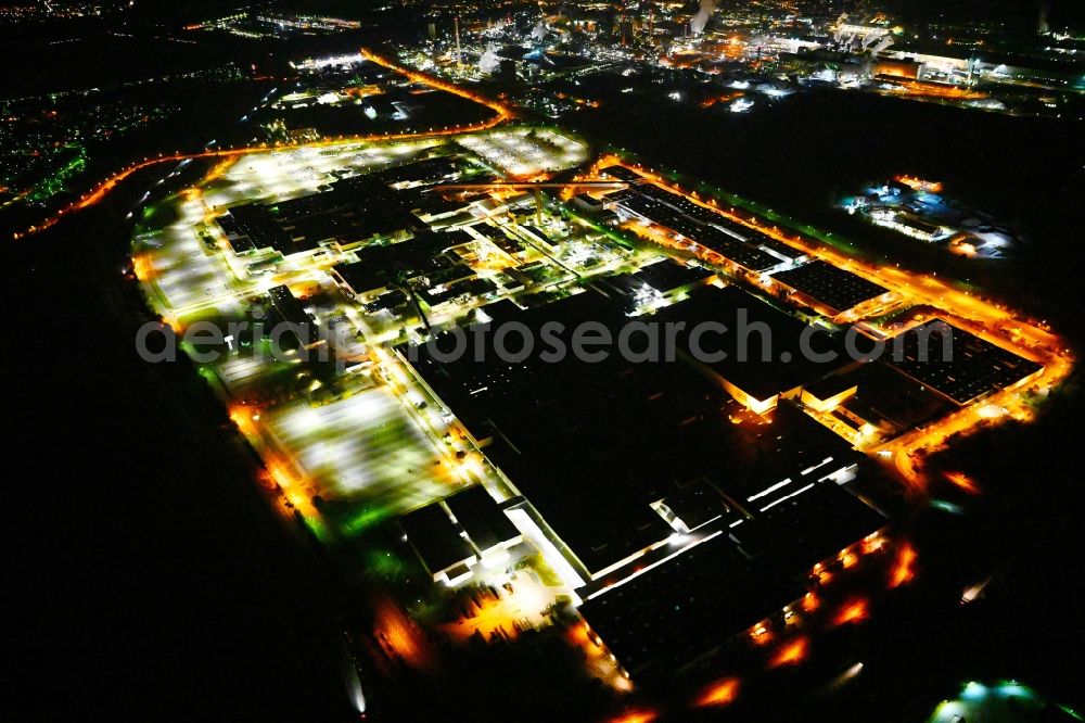 Saarlouis at night from above - Night lighting building and production halls on the premises of Ford factorye on Henry-Ford-Strasse in the district Roden in Saarlouis in the state Saarland, Germany