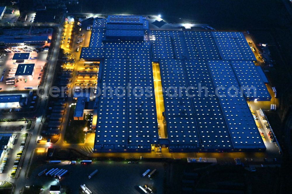 Thörey at night from above - Night lighting building and production halls on the premises of the Hoermann KG in Thoerey in the state Thuringia, Germany