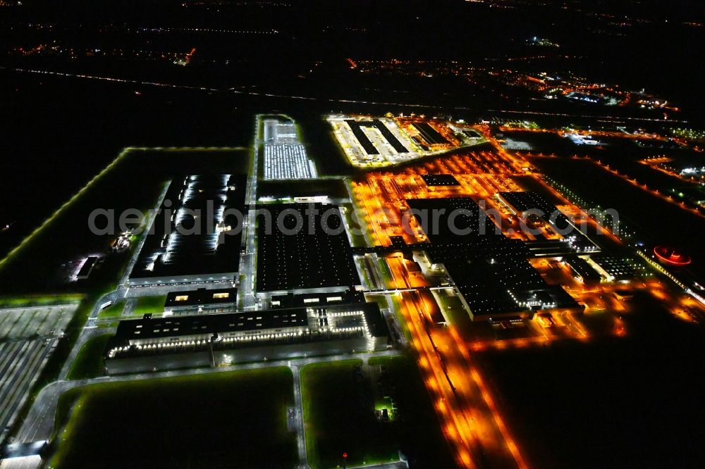 Leipzig at night from the bird perspective: Night lighting Building and production halls on the premises of Dr. Ing. h.c. F. Porsche AG on Porschestrasse in Leipzig in the state Saxony, Germany
