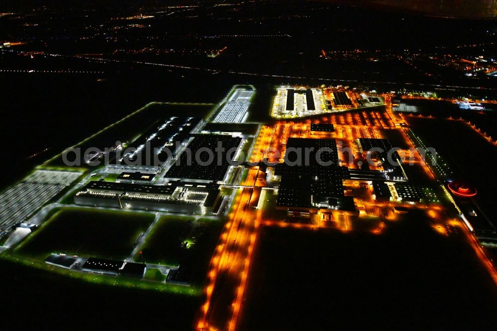 Aerial image at night Leipzig - Night lighting Building and production halls on the premises of Dr. Ing. h.c. F. Porsche AG on Porschestrasse in Leipzig in the state Saxony, Germany